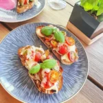 Heerlijke bruschetta met sappige cherrytomaten en verse basilicum – Eenvoudige handleiding voor de perfecte appetizer
